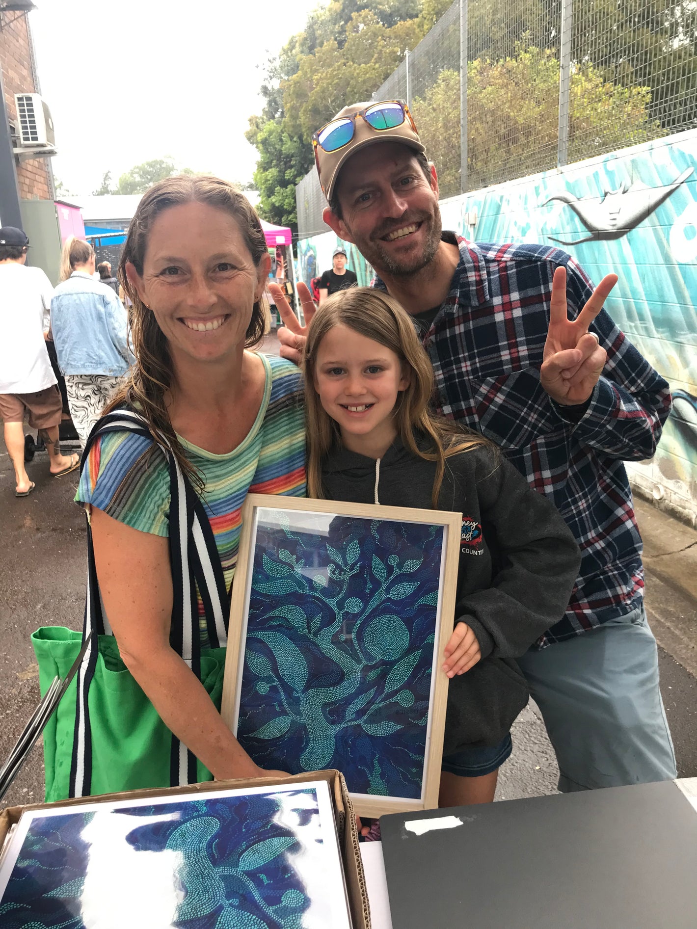 Natasha, Matilda and Michael of Maroubra very happy with their print of “Energy”